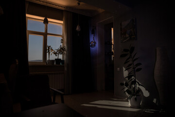 Night scene of moon seen through the window from dark room. Moonlight inside dark room. Long...