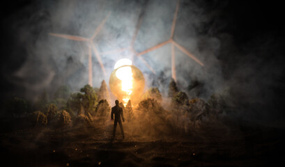 Obraz premium concept idea eco power energy. wind turbine on hill with sunset. Wind Turbine producing alternative energy.