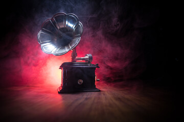 Obraz na płótnie Canvas Old gramophone on a dark background. Music concept