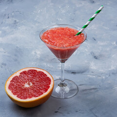 Grapefruit smoothie served in martini glass non-alcohol cocktail