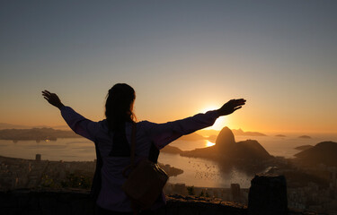 Fototapeta premium silhouette of a person with arms raised in Rio de Janeiro, Brazil