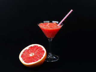 Grapefruit smoothie served in martini glass non-alcohol cocktail