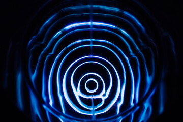 Sound waves in the dark. Blue color