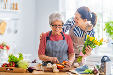 Happy family in the kitchen.