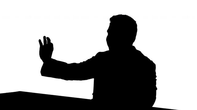 Silhouette Hispanic doctor talking to someone recommending new vaccine.