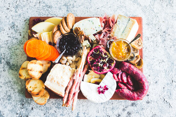 Assortment of tasty appetizers or antipasti. Charcuterie board.