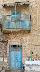 Old wooden doorways in abandoned egyptian house
