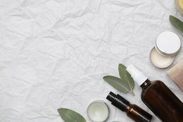 Natural, organic, plastic free skin care products. Facial serums, essentials oils, creams and soap bars, top view with copy space.