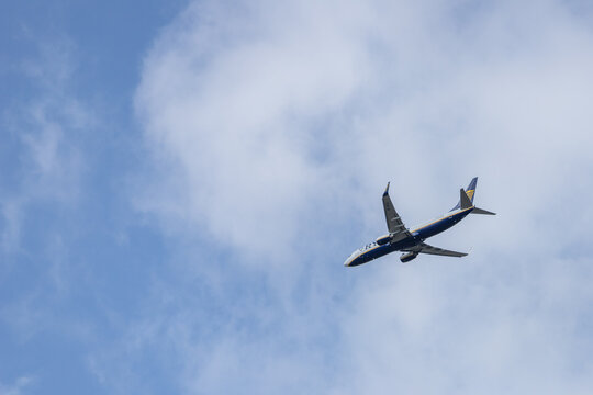Overath, NRW, Germany, 03 28 2021, Ryanair plane on its way to Cologne airport. view from below. blue sky as background