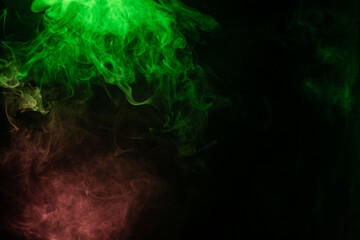 Green and pink steam on a black background.