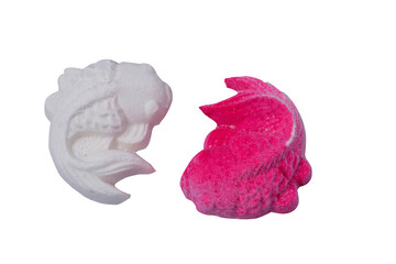 Kind of Chinese pancake made of rice-flour, a traditional fish-shaped snack. Pink and white