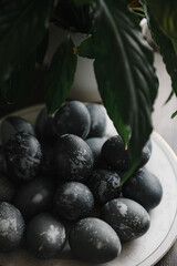blue-painted easter eggs on the table