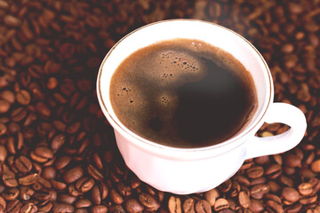 A cup of freshly brewed coffee.