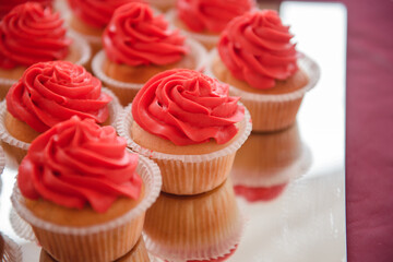 delicious holiday cakes in a bowl and scattered on the table