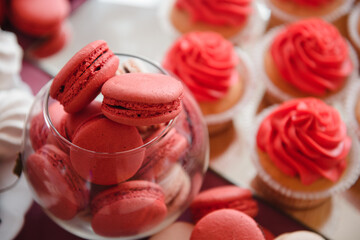 delicious holiday cakes in a bowl and scattered on the table