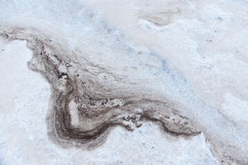 the expanse of salt lake Elton, beautiful surface, streaks, texture