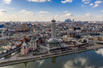panoramic view from drone on cityscape with river and bridges 