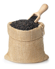 black sesame seeds in burlap sack isolated