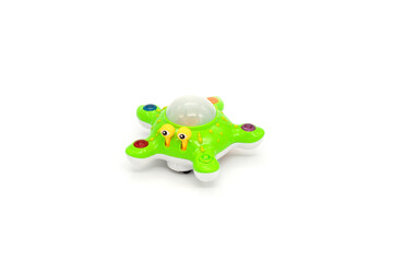 Plastic colorful octopus toy isolated white.