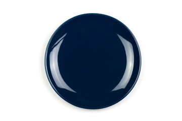 Blue empty plate isolated on white background, Top view. Plate made of ceramic. Exquisite tableware.