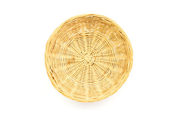 Empty Wicker basket isolate on white background, top view. Handmade utensils using natural materials.