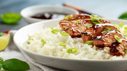 Teriyaki chicken with rice and red cabbage salad. Asian style food