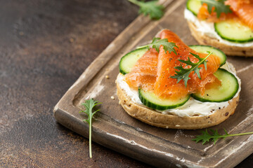 Fresh bagel with Salmon, cream cheese and cucumber