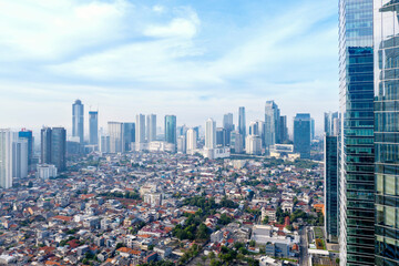 Fototapeta na wymiar Dense residential with highrise buildings in Jakarta
