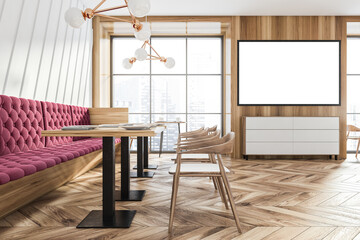 Wooden cafe interior with seats and table, window and mockup poster
