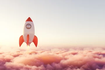 Fototapete Rocket is rising above pink pastel clouds towards success © ImageFlow
