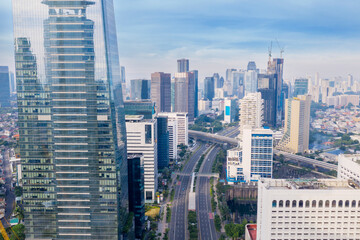 Fototapeta na wymiar Empty highway with highrise buildings in Jakarta