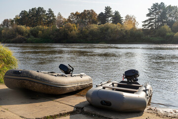 fishing boats with outboard motor at the pier