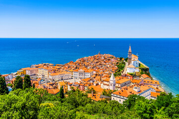 Fototapeta na wymiar Iconic aerial view of harbor fishing town of Piran, Slovenia on the Adriatic Sea riviera in the Mediterraniean Sea