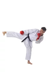Foto op Plexiglas Man training taekwondo on white © alotofpeople