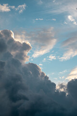 Amazing white and dark clouds in blue sky