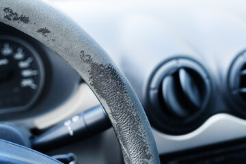 Car steering wheel. Substandard materials in the manufacture of automotive parts. Close-up