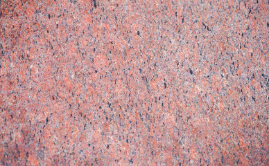 Stone structure of a stone slab, cut and processed from natural stone, photographed in daylight
