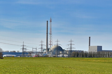 Fototapeta na wymiar Philippsburg, Germany - Former power plant with demolished cooling towers during nuclear power phase-out
