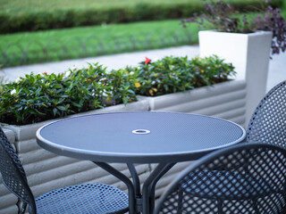 empty coffee table of a cozy outdoor restaurant