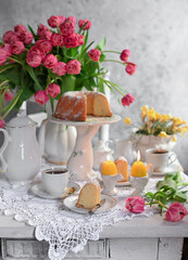 Easter cake. 
A traditional  cake with an easter decor. Easter eggs and spring flowers.