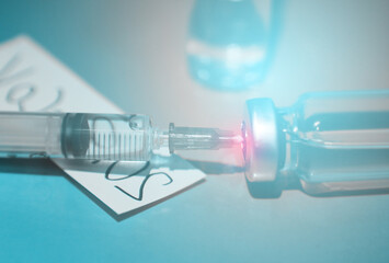 Vaccination concept. Syringe and medicine