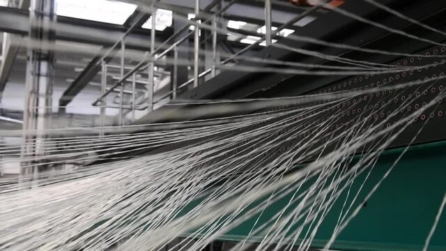 Yarn thread running in the machine