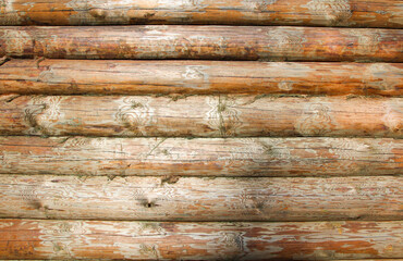 background of horizontal logs in the sun with shade