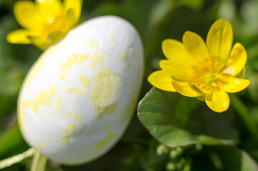 A yellow Easter egg in beautiful yellow colors. Easter composition