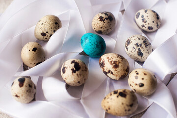 easter eggs on a background of satin ribbons