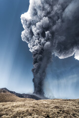 Incredible and frightening eruptive event of the Etna volcano, huge column of smoke in the sky....