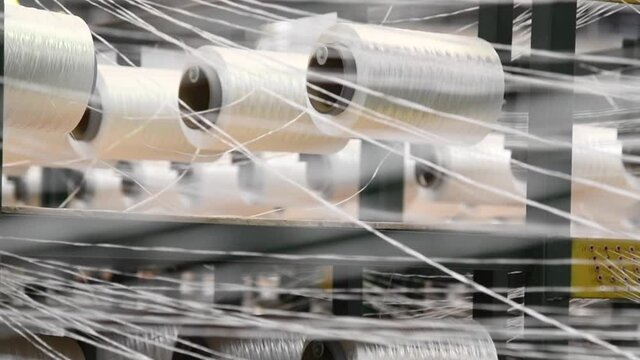 Yarn thread running in the machine