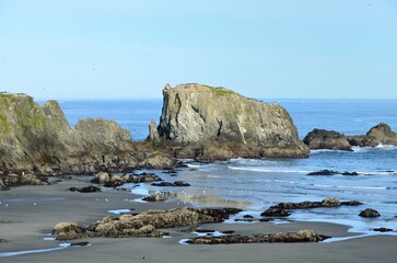 Looking Down At seagulls Feeding In The Surf In Around Rock Out Crop’s At Coquille Point Beach, Kronenberg park, Bandon, Coos County, Oregon