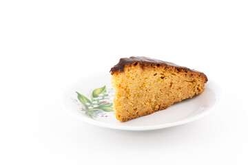 Piece of Cake on Plate. Isolated on White Background