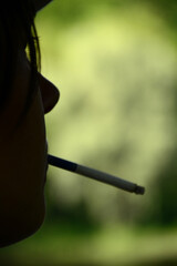 the pensive image of a smoking man